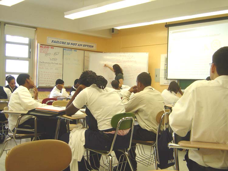 teaching a class at Frederick Douglass Academy in Harlem, NY